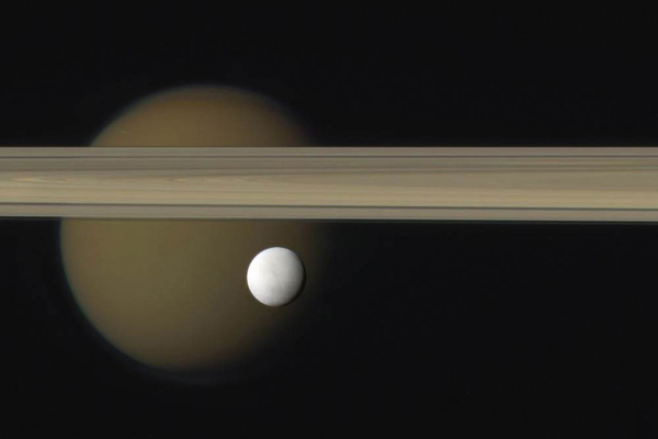 Enceladus, Saturn's rings and other moon, Titan