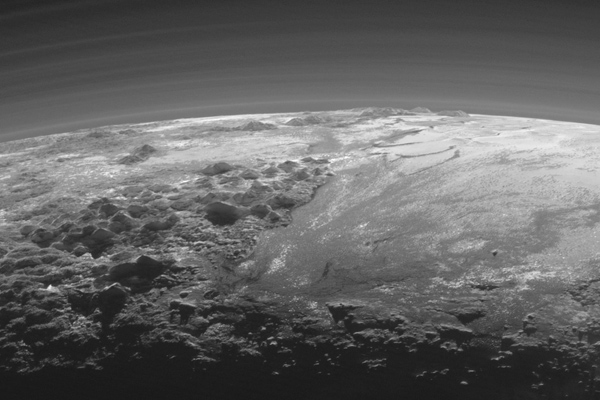 Majestic Mountains and Frozen Plains on Pluto