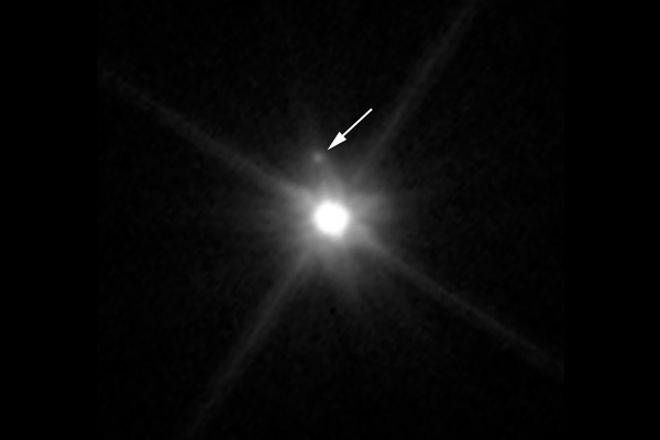 Makemake with its moon by Hubble Space Telescope