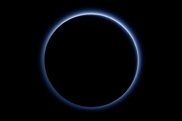 Pluto's atmosphere backlit by the Sun