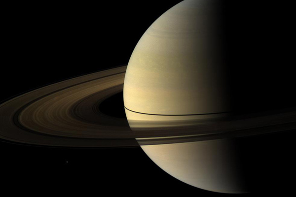 Saturn and Mimas (tiny white dot in the lower left)
